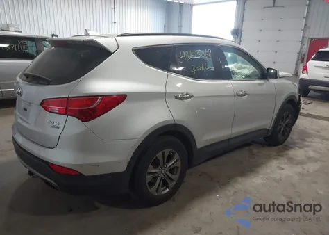 2014 Hyundai Santa Fe Sport 2.4L z USA, uszkodzony, nr VIN 5XYZUDLB8EG173511